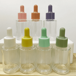 transparent flat shoulder dropper with purple cap