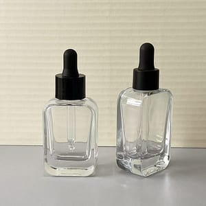 circle dropper bottle with black cap