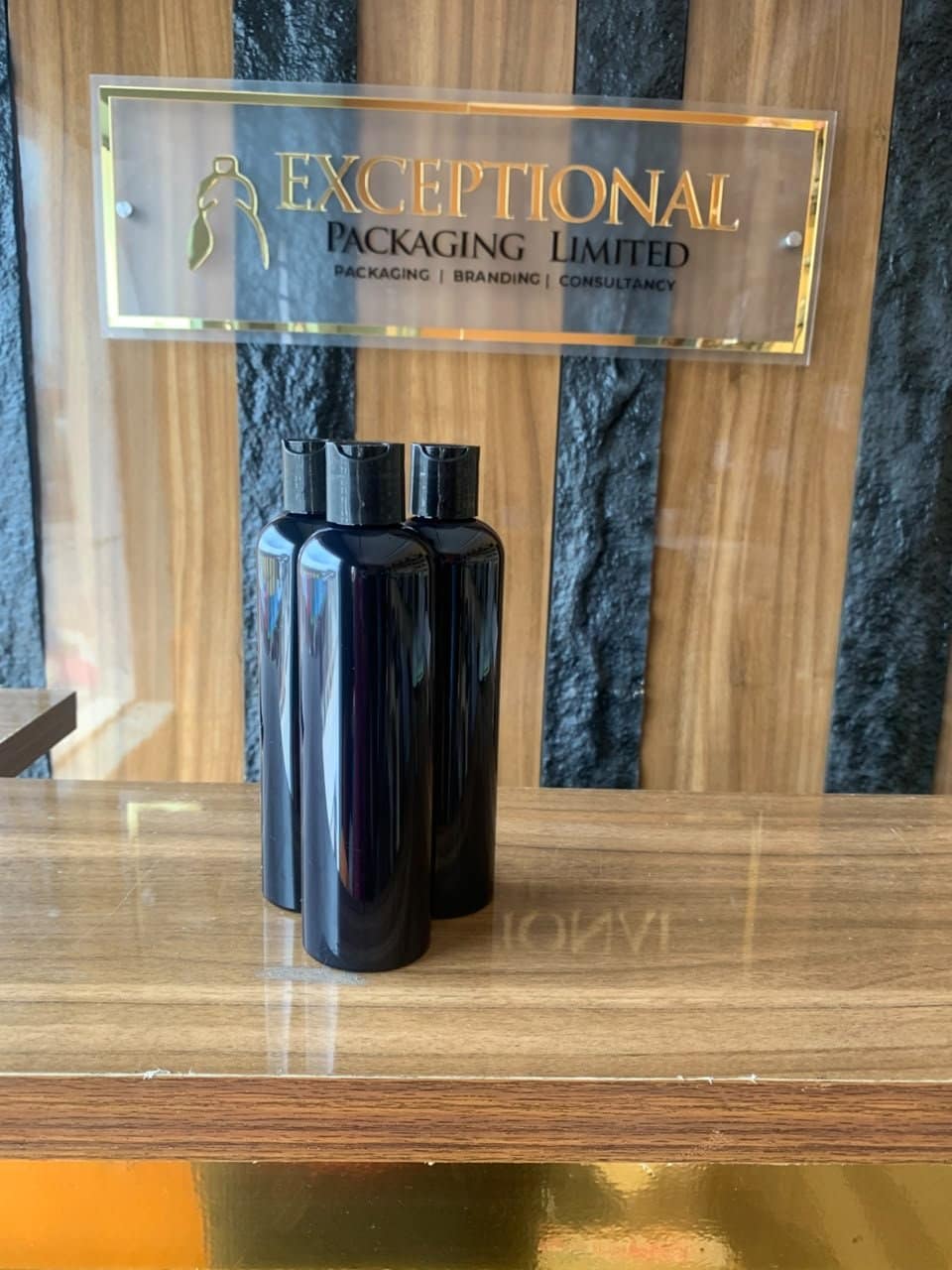 black pet bottles with side press black pet bottles with side press