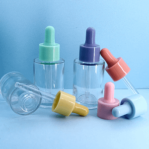 transparent flat shoulder dropper with purple cap