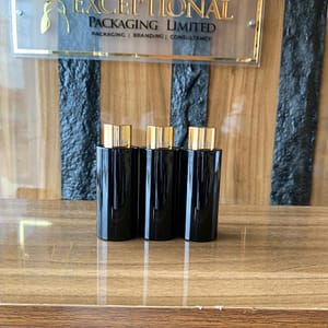 black pet bottle with gold cover